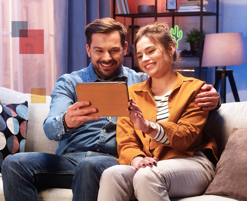 Image of couple sitting on couch