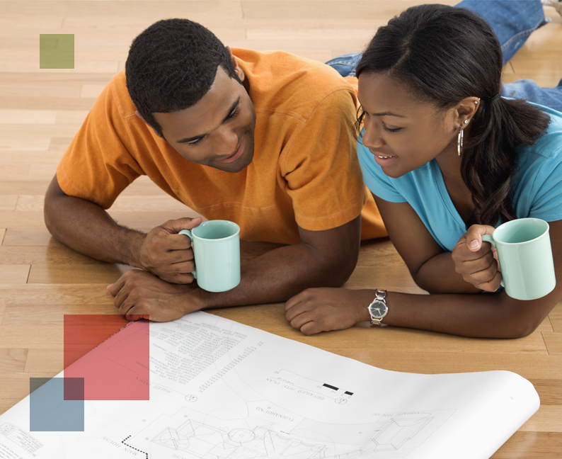 Image of man and woman reviewing home plans